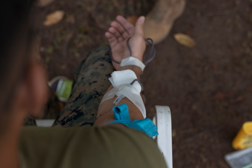 MRF-D Navy Corpsmen practice blood drawing alongside U.S. and Australian Army Soldiers