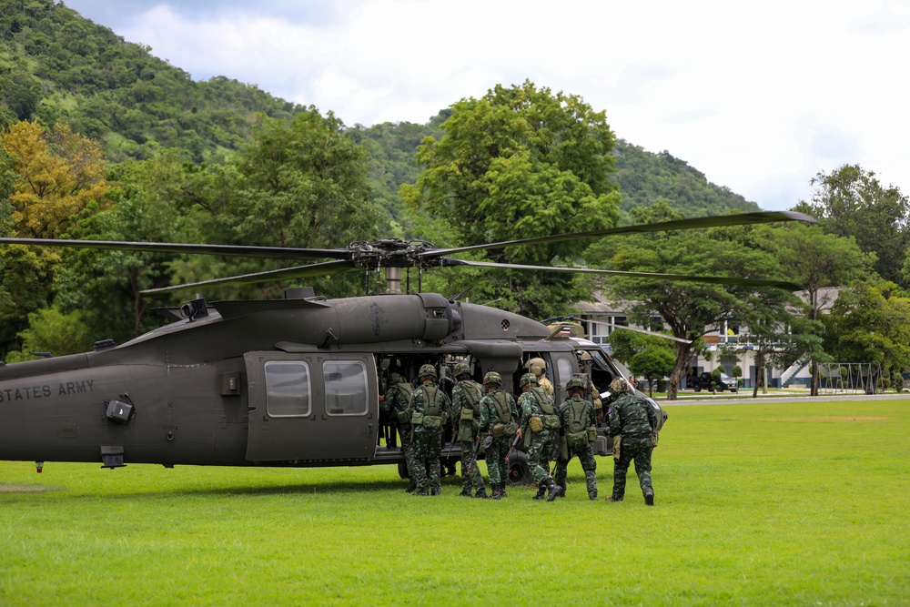 Royal Thai Army board a U.S. Army UH-60 Black Hawk helicopter during collaborative air assault operations as part of Exercise Hanuman Guardian 2023