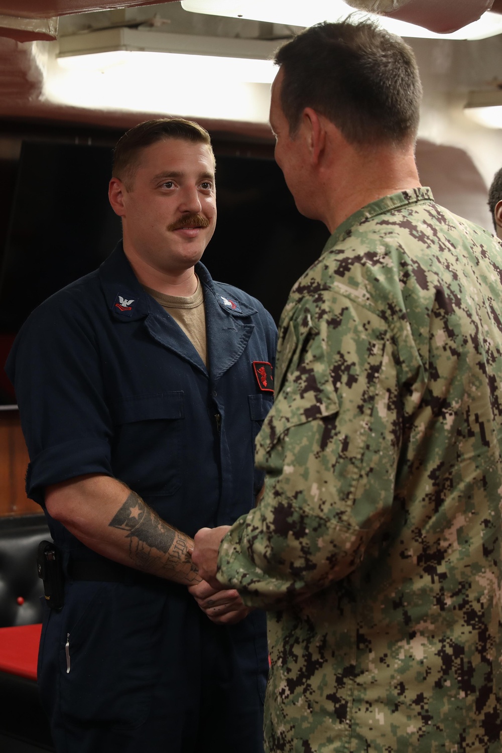 Sailor Recieves CHallenge Coin