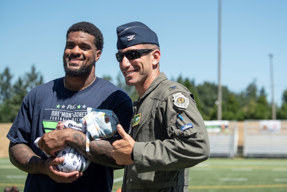 Seahawks Dre’Mont Jones host football camp for JBLM children