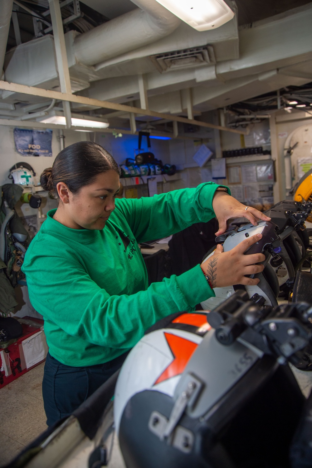 USS Ronald Reagan (CVN 76) squadrons perform equipment maintenance and inspections.