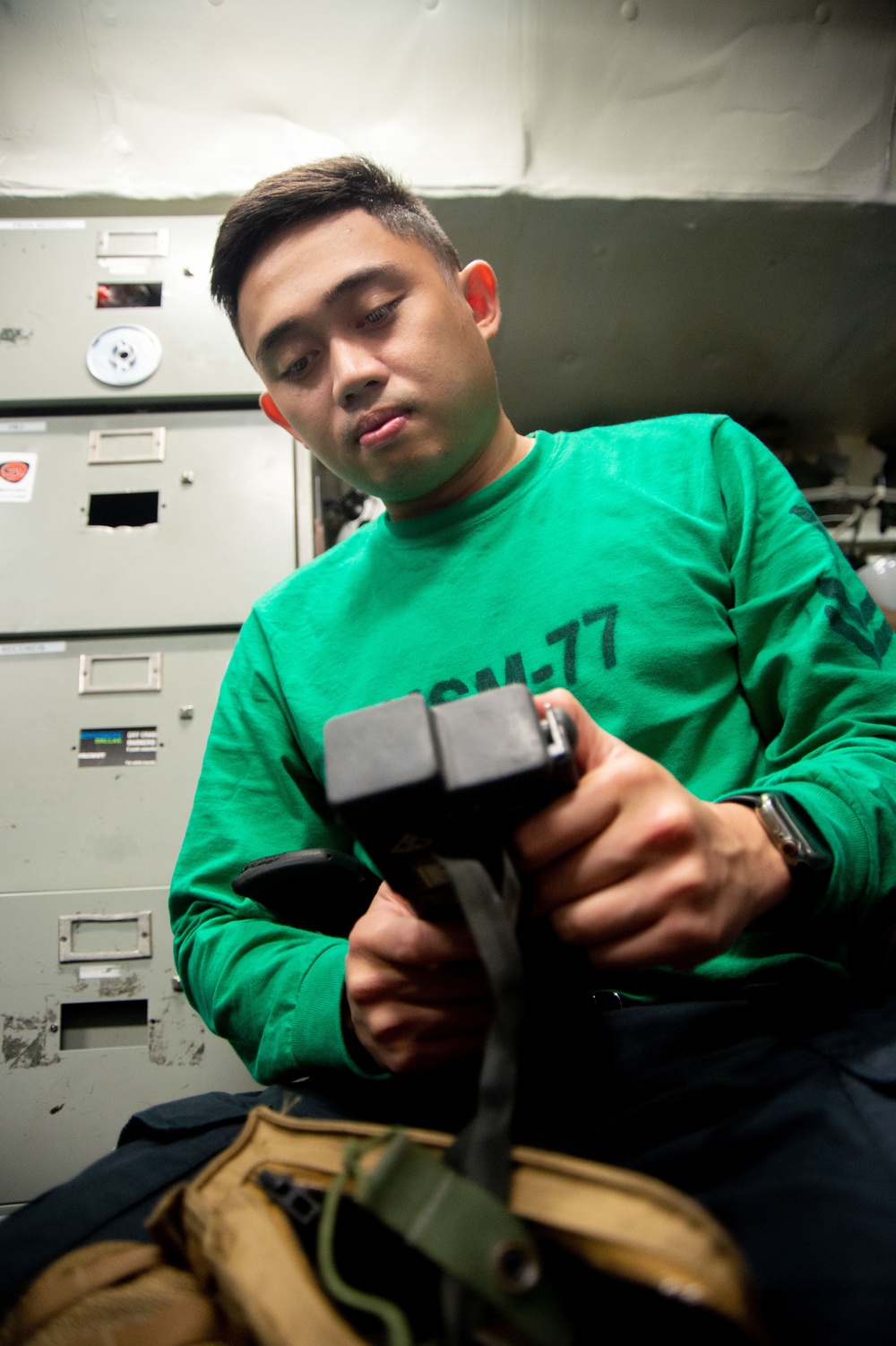 USS Ronald Reagan (CVN 76) squadrons perform equipment maintenance and inspections.