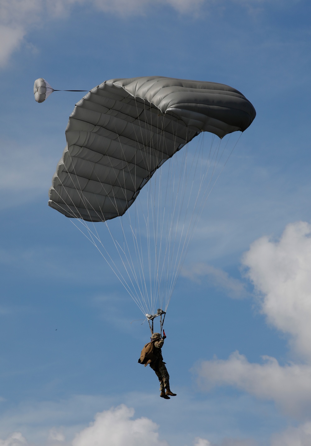 Service members of Belize, Mexico, Guyana, France, and U.S. train in airborne based operations.