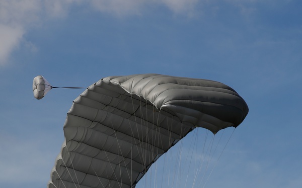 Service members of Belize, Mexico, Guyana, France, and U.S. train in airborne based operations.