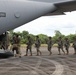 Service members of Belize, Mexico, Guyana, France, and U.S. train in airborne based operations.