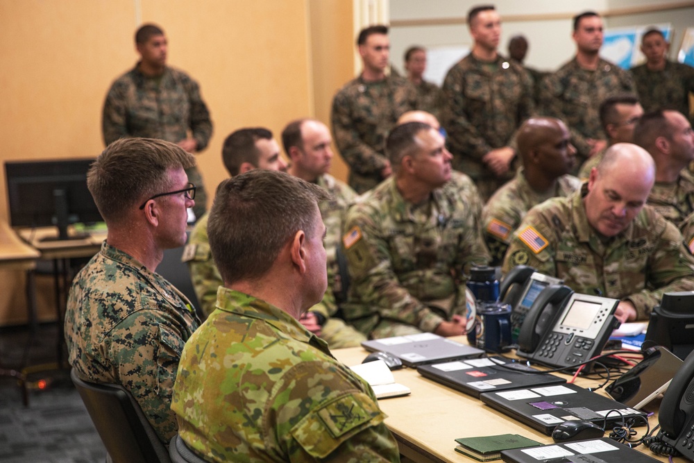 U.S. Marines with 1st Marine Division attend staff brief for Talisman Sabre 23