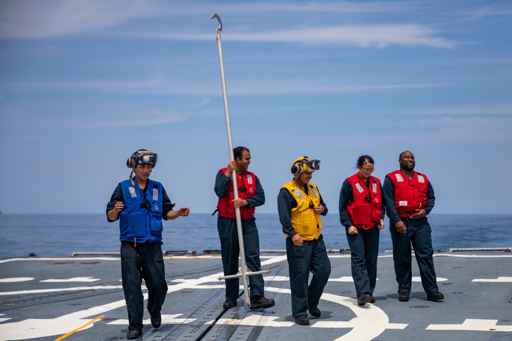 USS Ralph Johnson Sailors conduct flight quarters in the Sea of Japan.