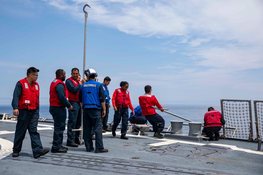 USS Ralph Johnson Sailors conduct flight quarters in the Sea of Japan.