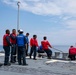 USS Ralph Johnson Sailors conduct flight quarters in the Sea of Japan.