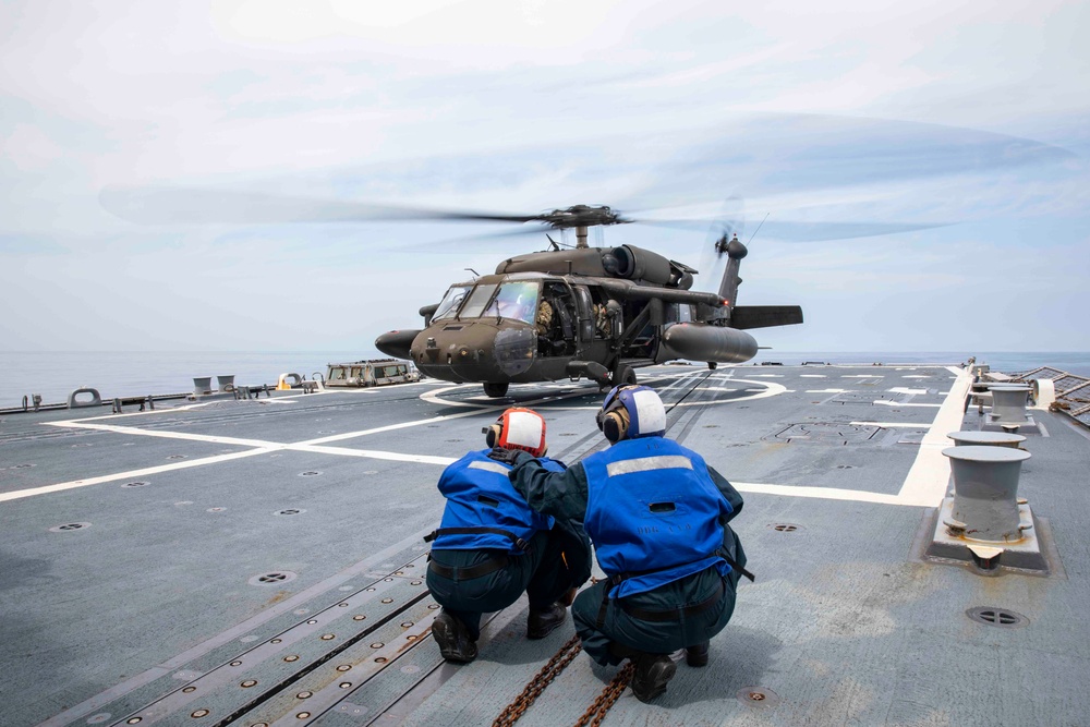 USS Ralph Johnson Sailors conduct flight quarters in the Sea of Japan.