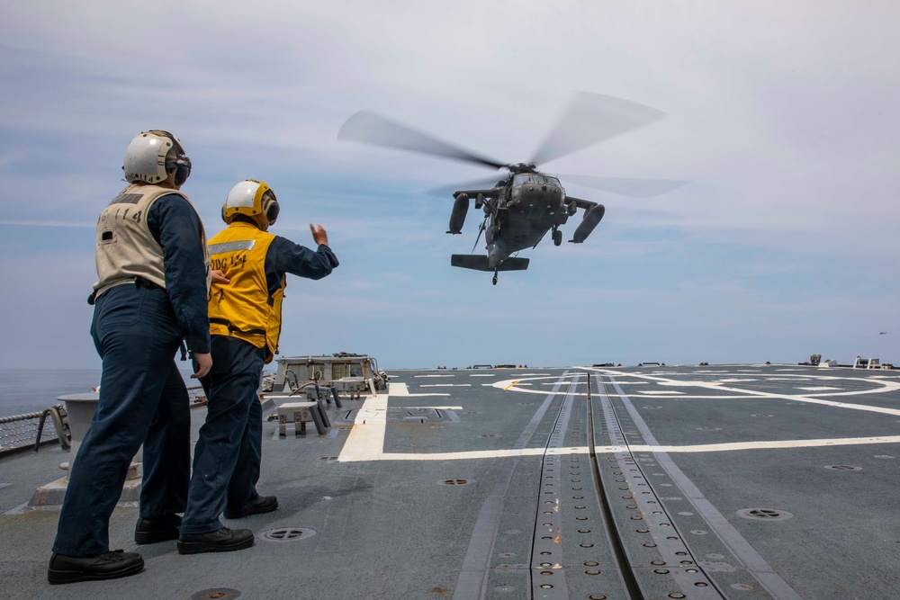 USS Ralph Johnson Sailors conduct flight quarters in the Sea of Japan.