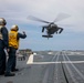 USS Ralph Johnson Sailors conduct flight quarters in the Sea of Japan.