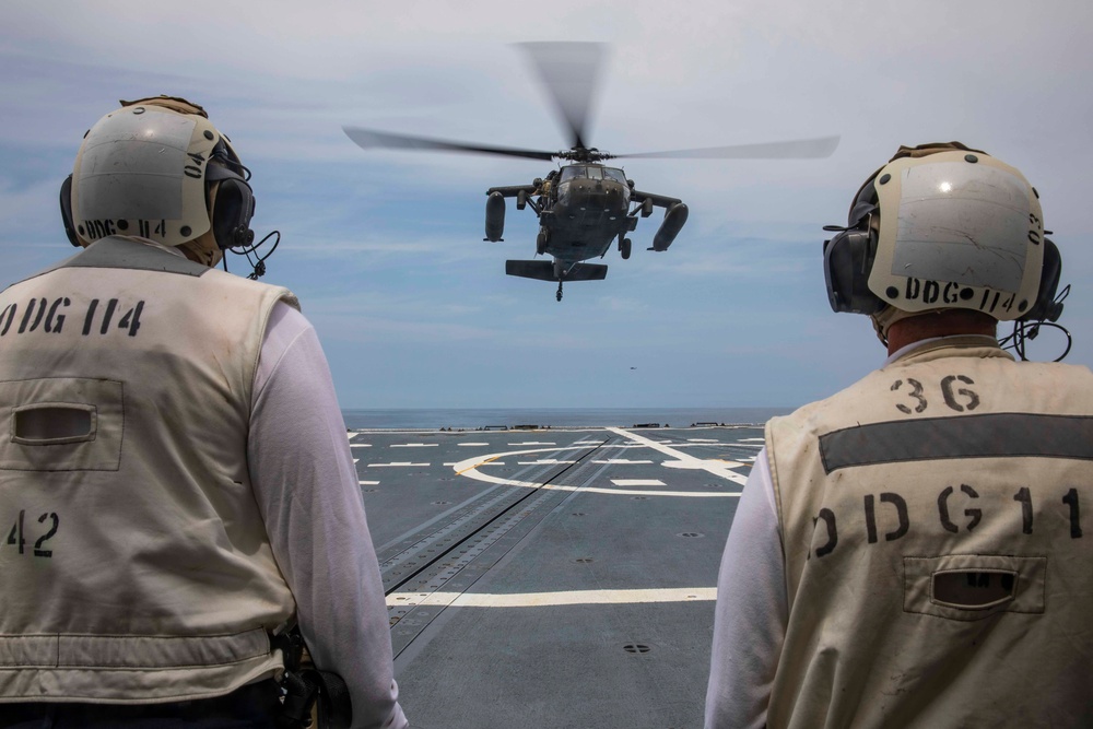 USS Ralph Johnson Sailors conduct flight quarters in the Sea of Japan.