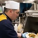 USS Princeton Sailors Cook Dinner