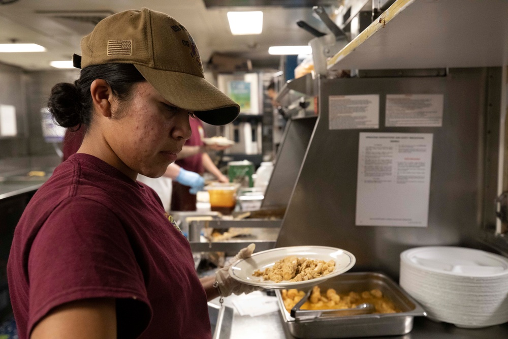 USS Princeton Sailors Cook Dinner