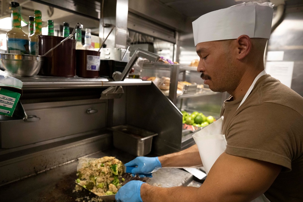 USS Princeton Sailors Cook Dinner