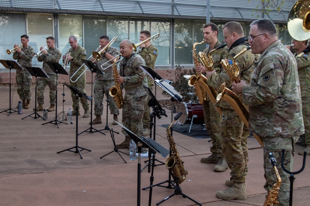 America’s First Corps Band performs alongside Australian counterparts during impromptu dinner performance