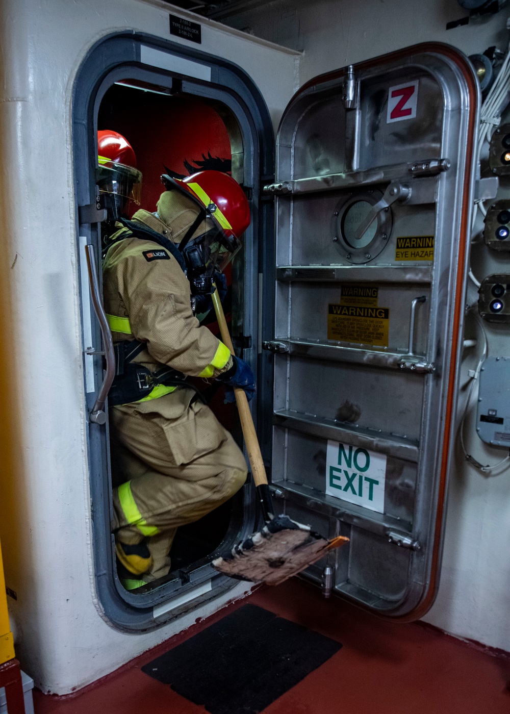 Sailors Aboard USS John Finn (DDG 113) Conduct Fire Drill