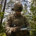 U.S. Army Soldier Utilizes Compass for Land Navigation