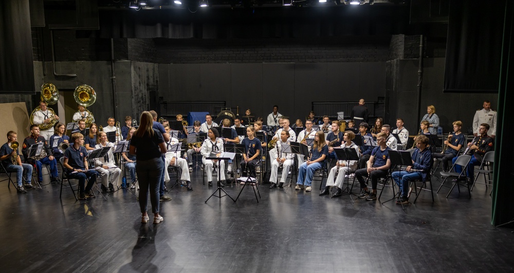 U.S. Marines and sailors with U.S. Naval Forces Europe and Africa perform at Vilkaviskis, Lithuania