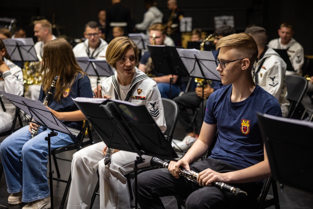 U.S. Marines and sailors with U.S. Naval Forces Europe and Africa perform at Vilkaviskis, Lithuania