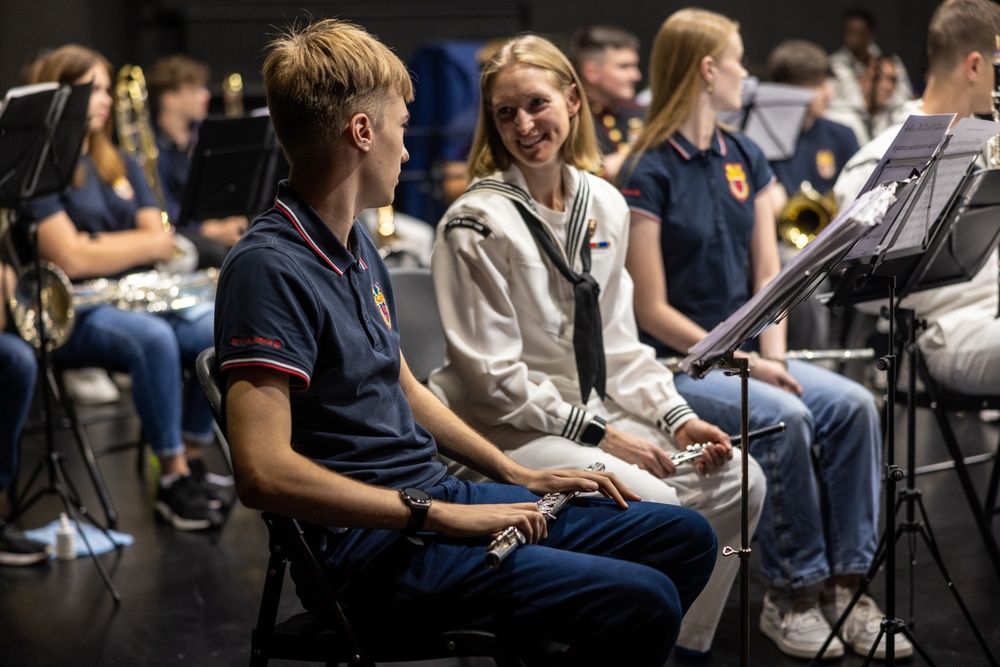 U.S. Marines and sailors with U.S. Naval Forces Europe and Africa perform at Vilkaviskis, Lithuania