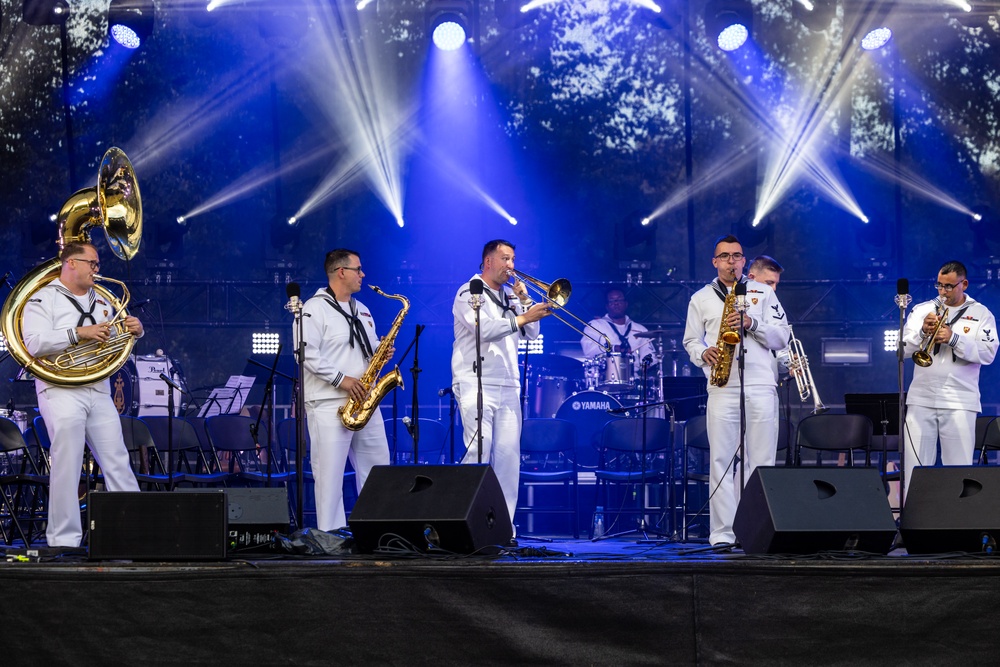 U.S. Marines and sailors with U.S. Naval Forces Europe and Africa perform at Vilkaviskis, Lithuania