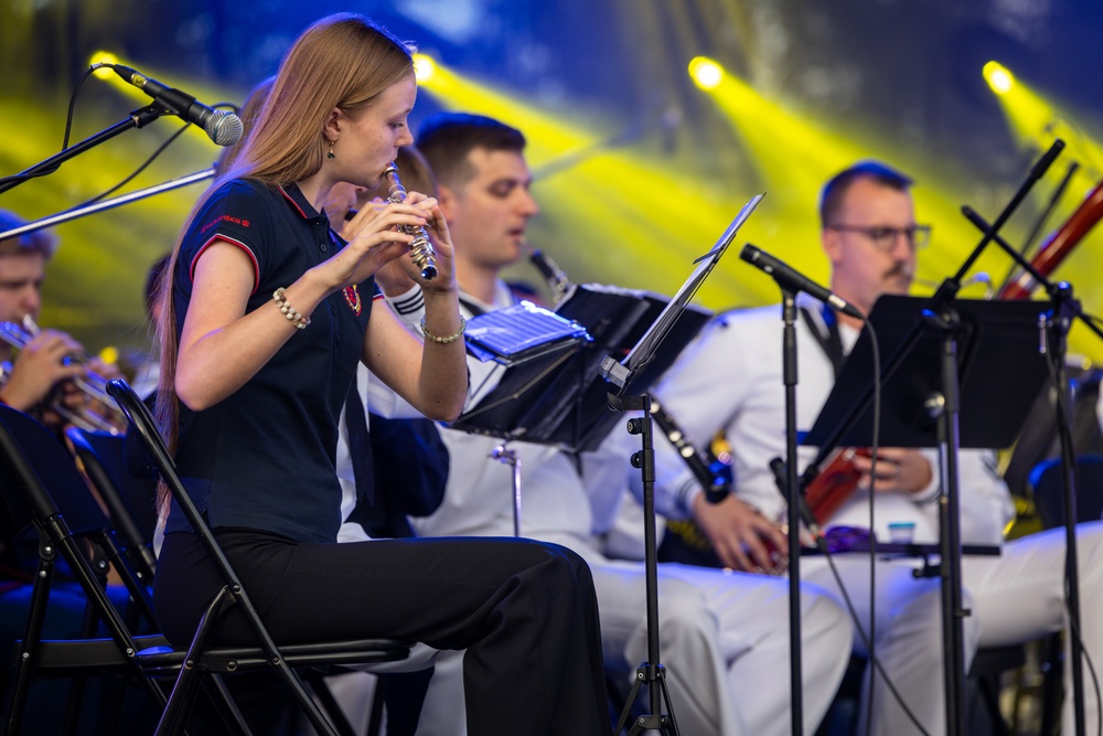 U.S. Marines and sailors with U.S. Naval Forces Europe and Africa perform at Vilkaviskis, Lithuania