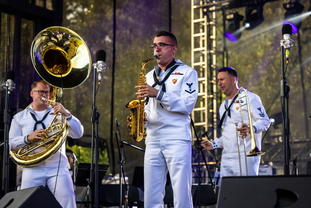 U.S. Marines and sailors with U.S. Naval Forces Europe and Africa perform at Vilkaviskis, Lithuania