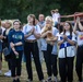 U.S. Marines and sailors with U.S. Naval Forces Europe and Africa perform at Vilkaviskis, Lithuania