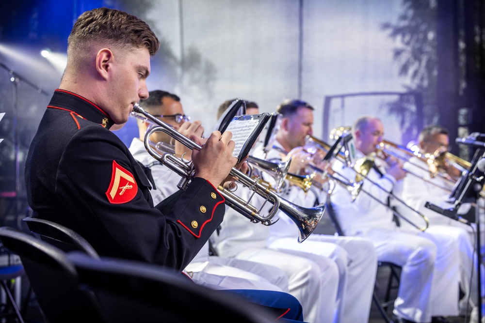 U.S. Marines and sailors with U.S. Naval Forces Europe and Africa perform at Vilkaviskis, Lithuania