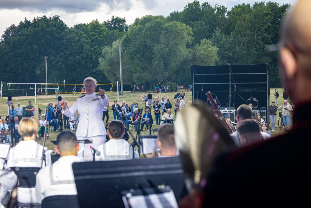 U.S. Marines and sailors with U.S. Naval Forces Europe and Africa perform at Vilkaviskis, Lithuania