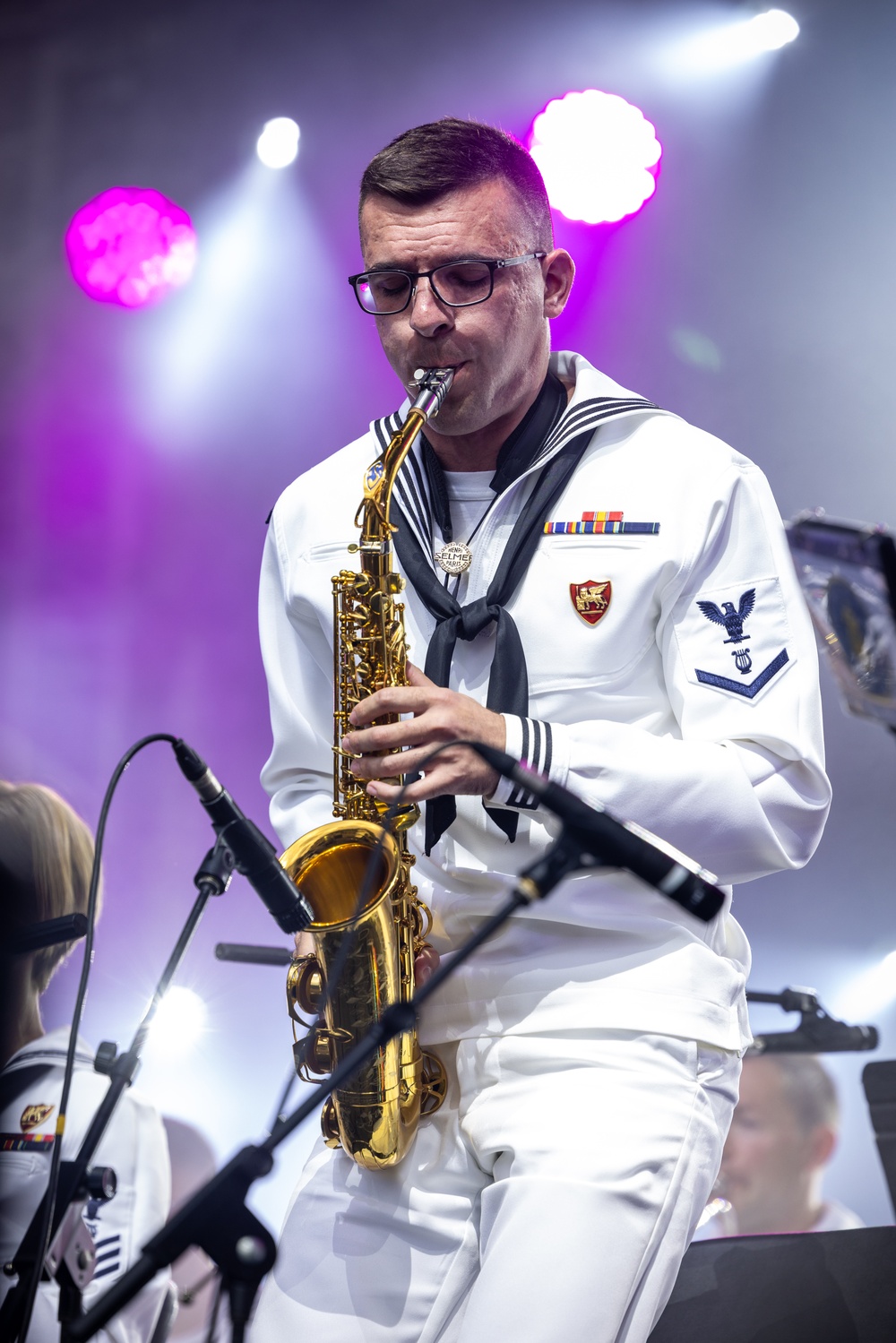 U.S. Marines and sailors with U.S. Naval Forces Europe and Africa perform at Vilkaviskis, Lithuania