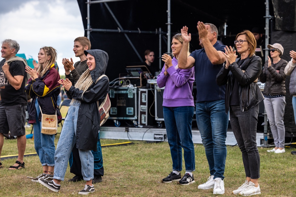 U.S. Marines and sailors with U.S. Naval Forces Europe and Africa perform at Vilkaviskis, Lithuania