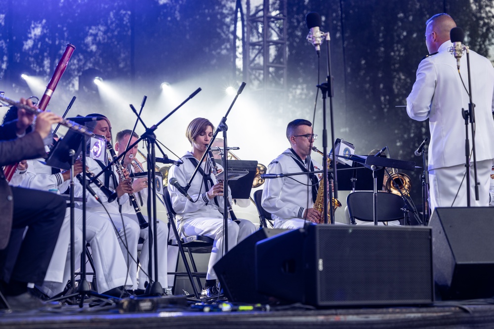 U.S. Marines and sailors with U.S. Naval Forces Europe and Africa perform at Vilkaviskis, Lithuania