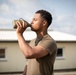 U.S. Army Soldier hydrating after Ruck March