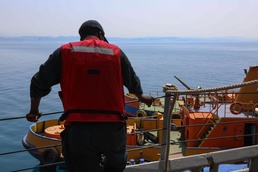 Sailor Watches Barge Pull In