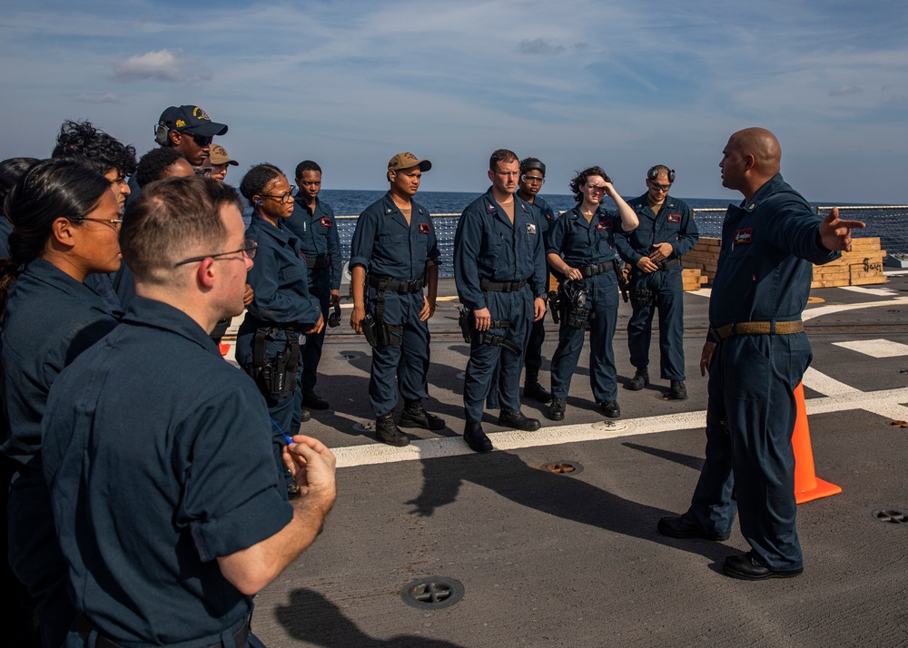 USS Rafael Peralta (DDG 115) conducts a marksmanship qualification course on the flight deck