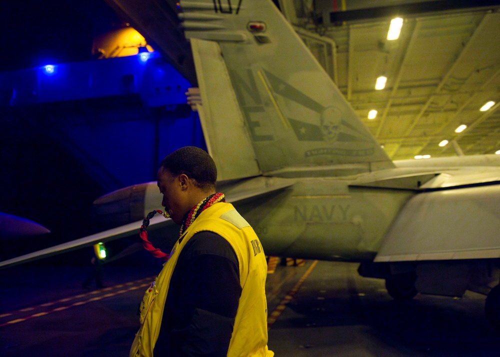 USS Carl Vinson (CVN 70) Sailors Move Aircraft