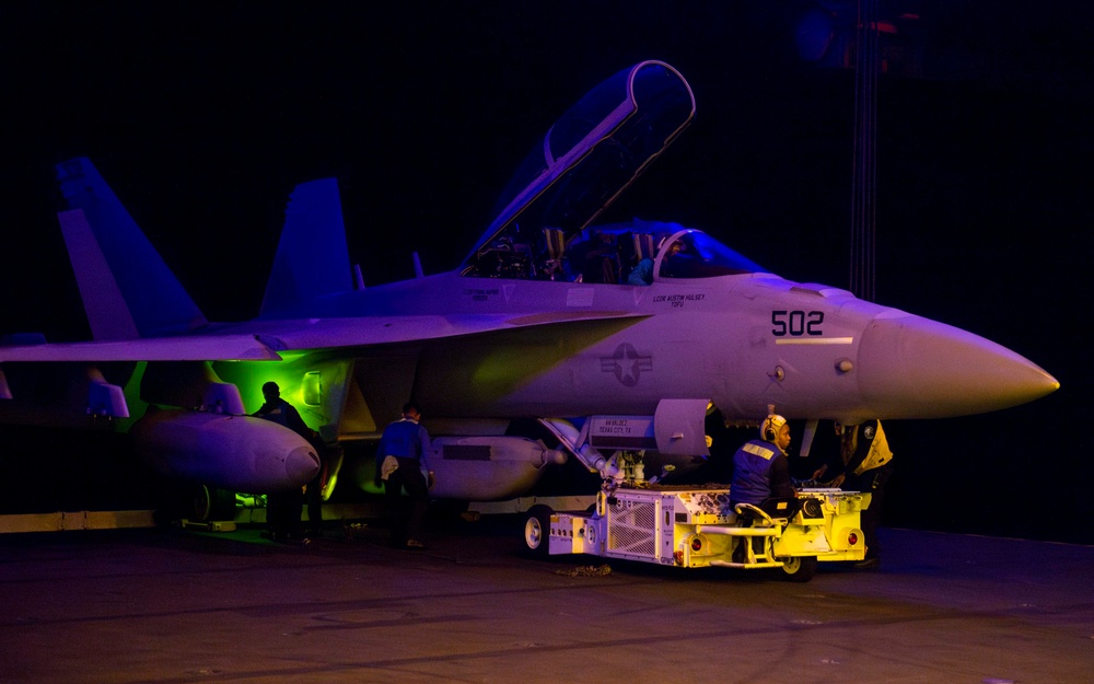 USS Carl Vinson (CVN 70) Sailors Move Aircraft