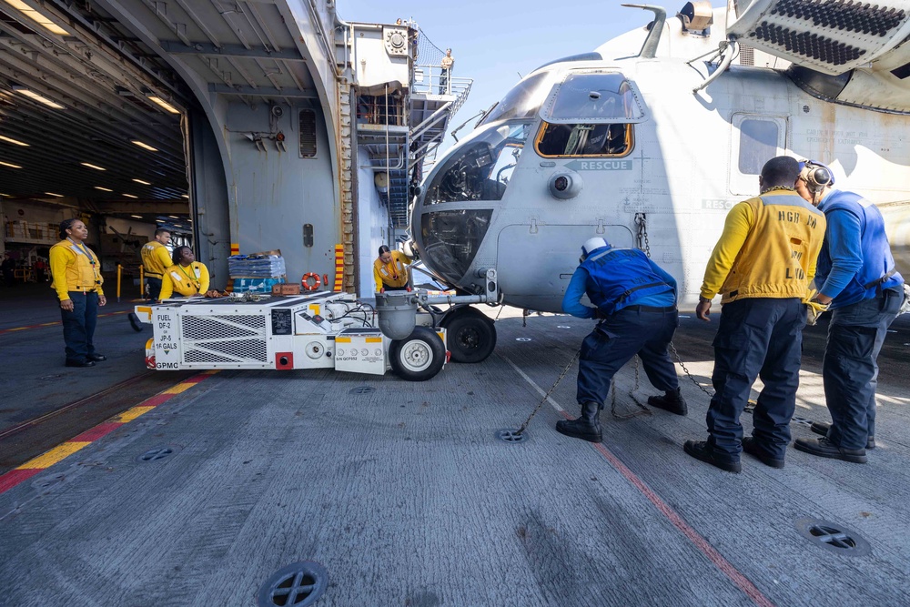 DVIDS - Images - USS Bataan Sailors move an aircraft [Image 2 of 19]