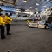 USS Bataan Sailors move an aircraft