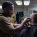 USS Bataan Sailors conduct retail services