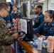 USS Bataan Sailors conduct retail services