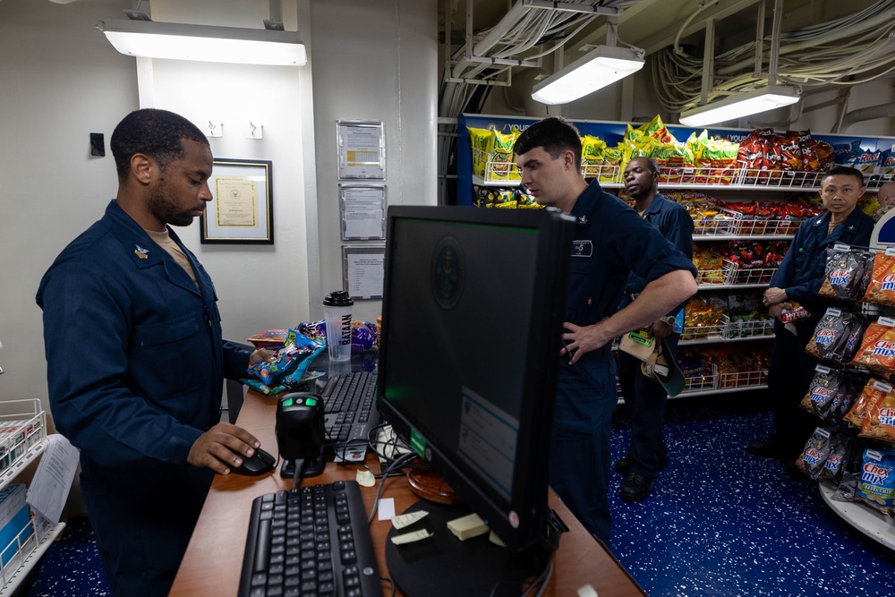 USS Bataan Sailors conduct retail services