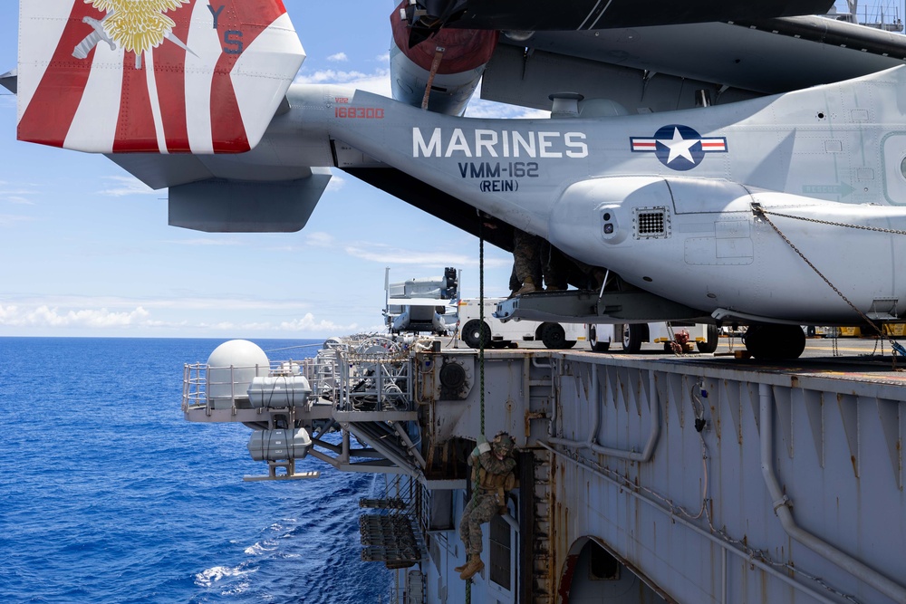 26th MEU Marines fast rope on USS Bataan