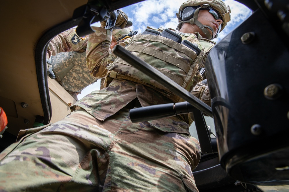 Gunner Operating a M240B Machine Gun