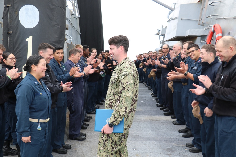 Sailor Departs USS Kidd