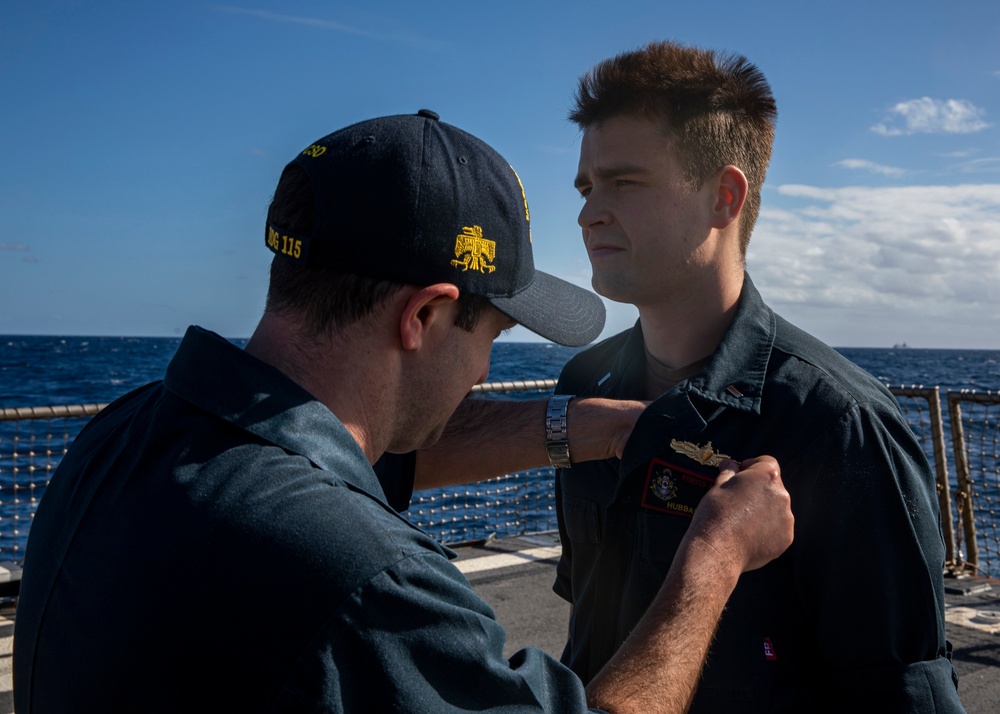 USS Rafael Peralta (DDG 115) conducts a SWO pinning on the flight deck