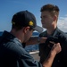 USS Rafael Peralta (DDG 115) conducts a SWO pinning on the flight deck